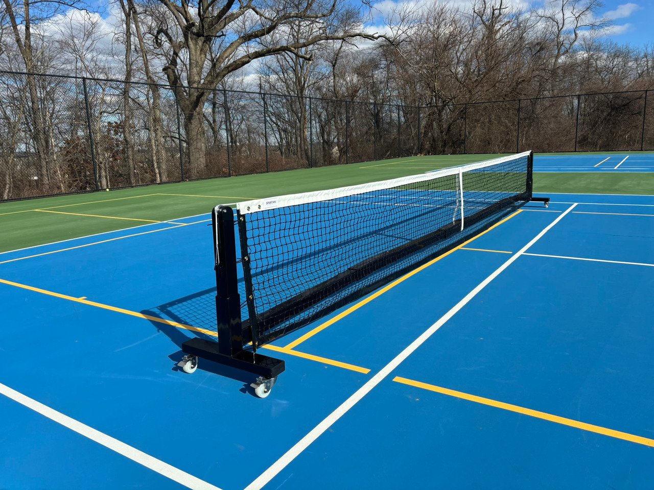 Pro Heavy Duty Portable Pickleball Net System 3 Pro heavy duty portable pickleball net frame showing black powder coated steel construction and rigid base.