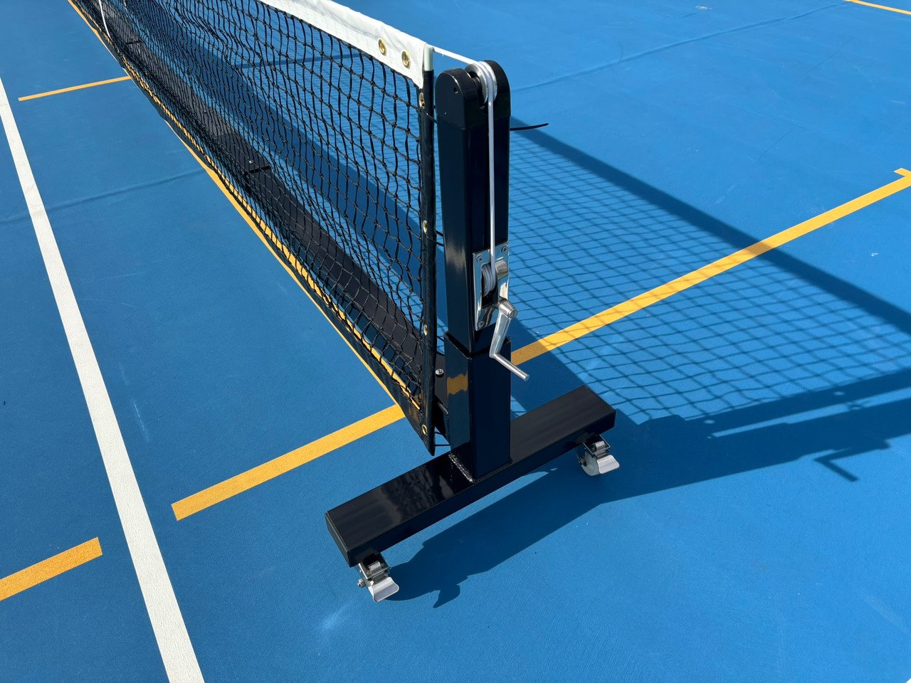 Pro Heavy Duty Portable Pickleball Net System 4 Angled view of black powder coated steel frame showing structural thickness and build quality.
